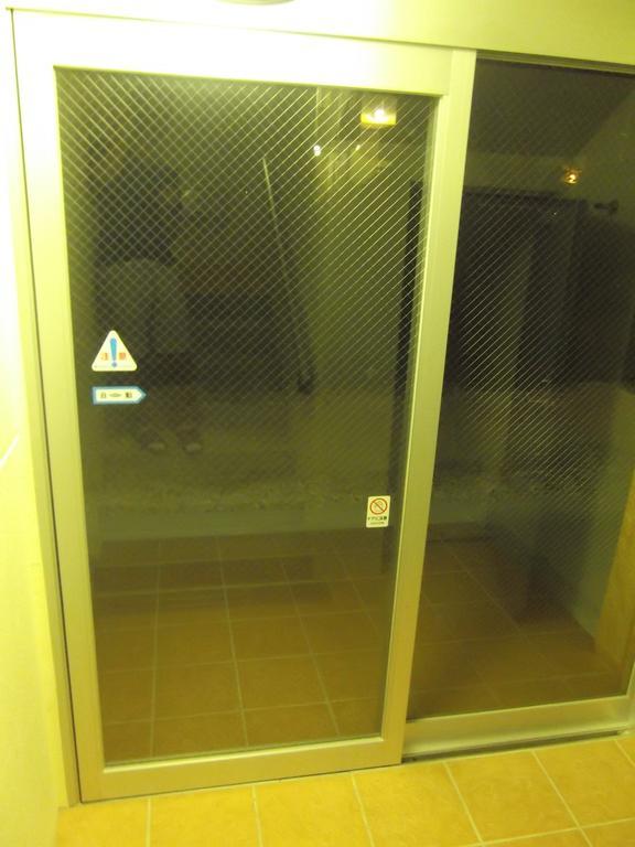 Apartamento Rainbow Terrace Ginowan Habitación foto
