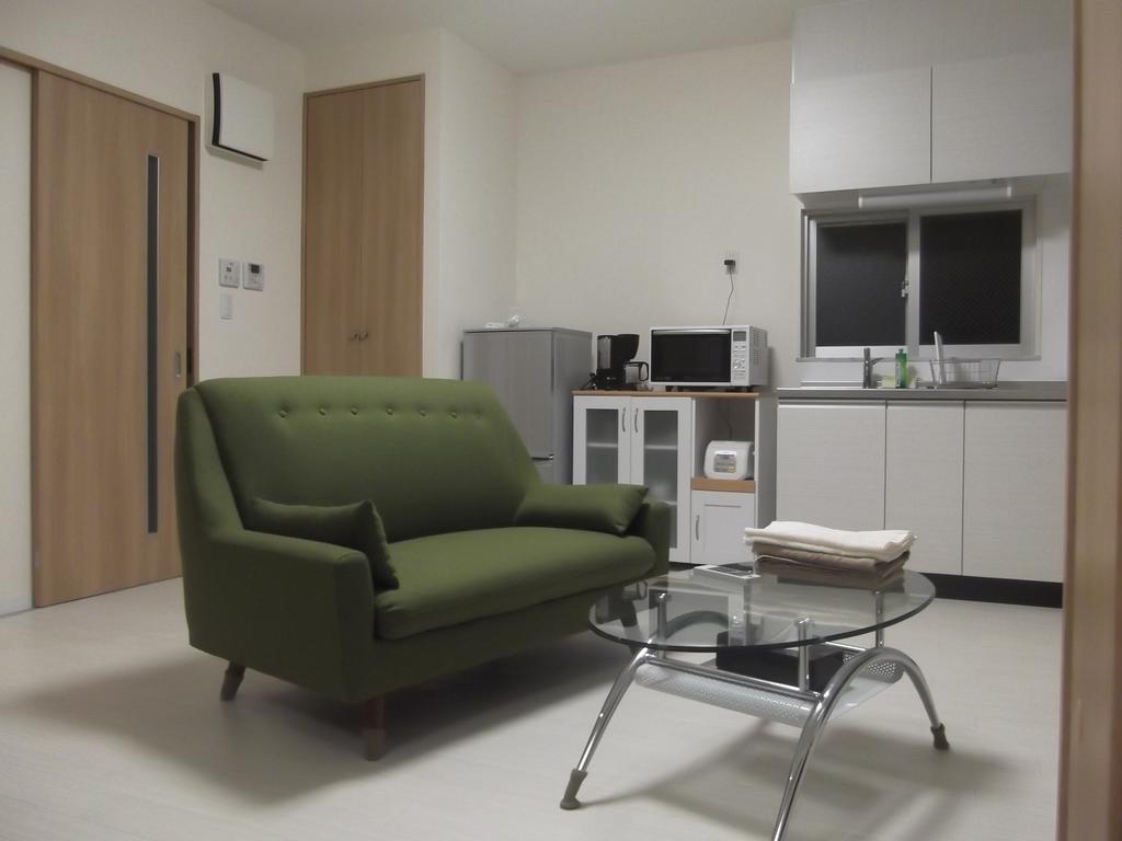 Apartamento Rainbow Terrace Ginowan Exterior foto