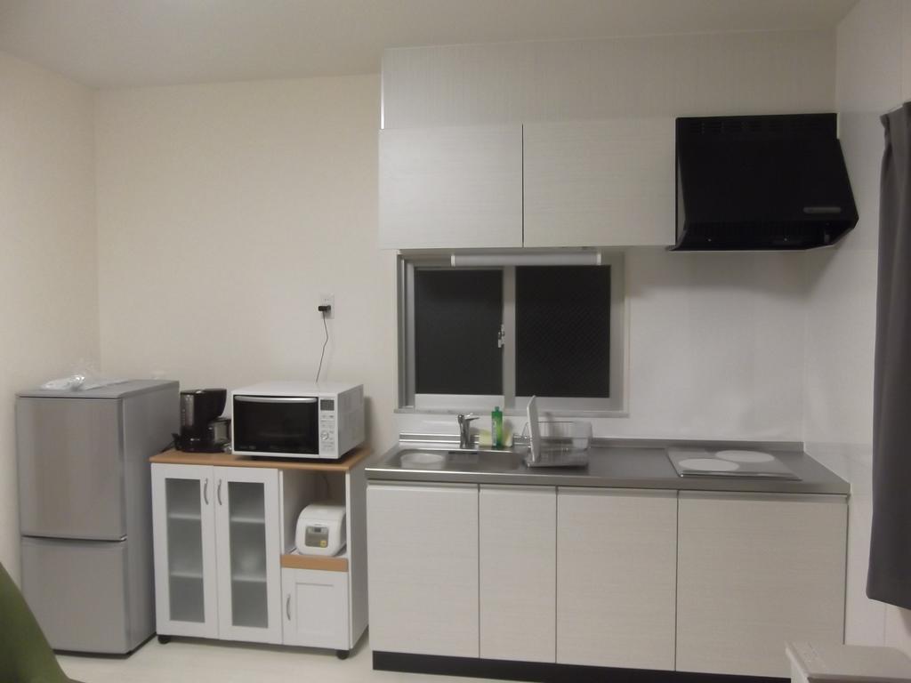 Apartamento Rainbow Terrace Ginowan Exterior foto